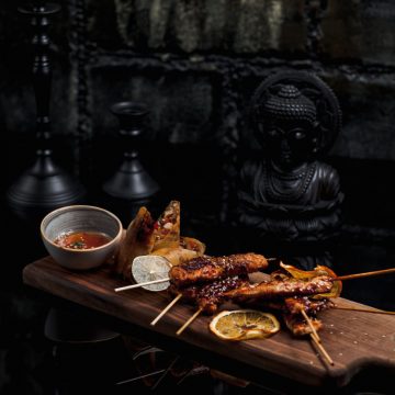 stick-kebab-finely-cooked-served-with-orange-sauce